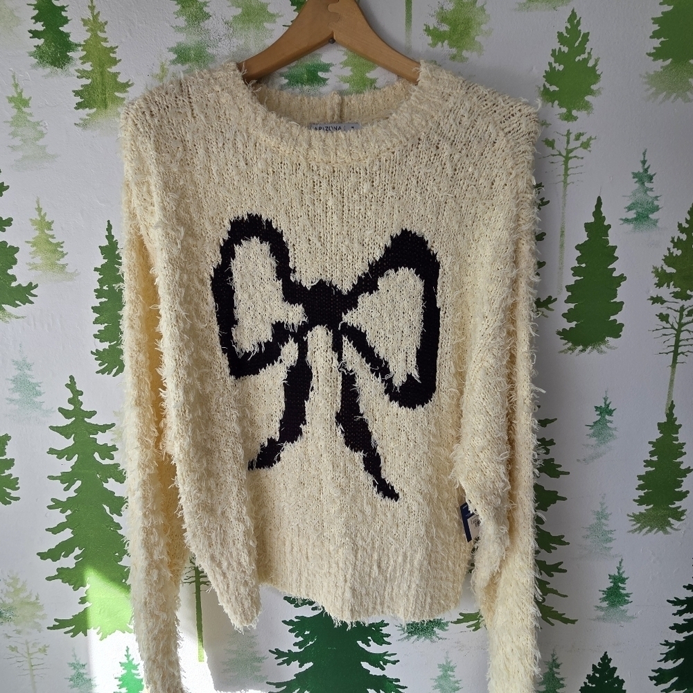 Cozy Cream Womens/Juniors Pullover Sweater with Black Bow Design